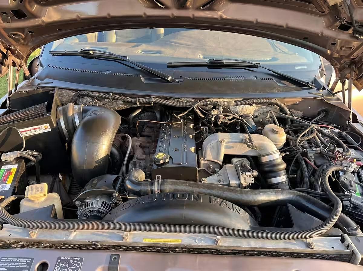 Engine bay — before vs after (after)